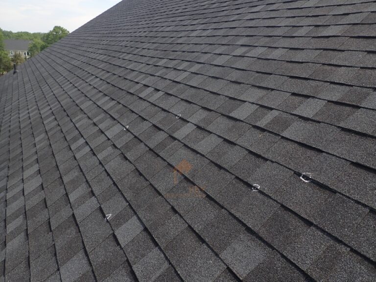 exposed nails on asphalt shingle roof noted with chalk